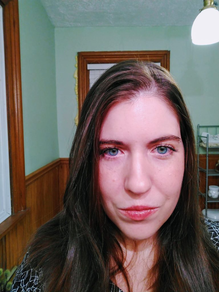 woman testing concealer