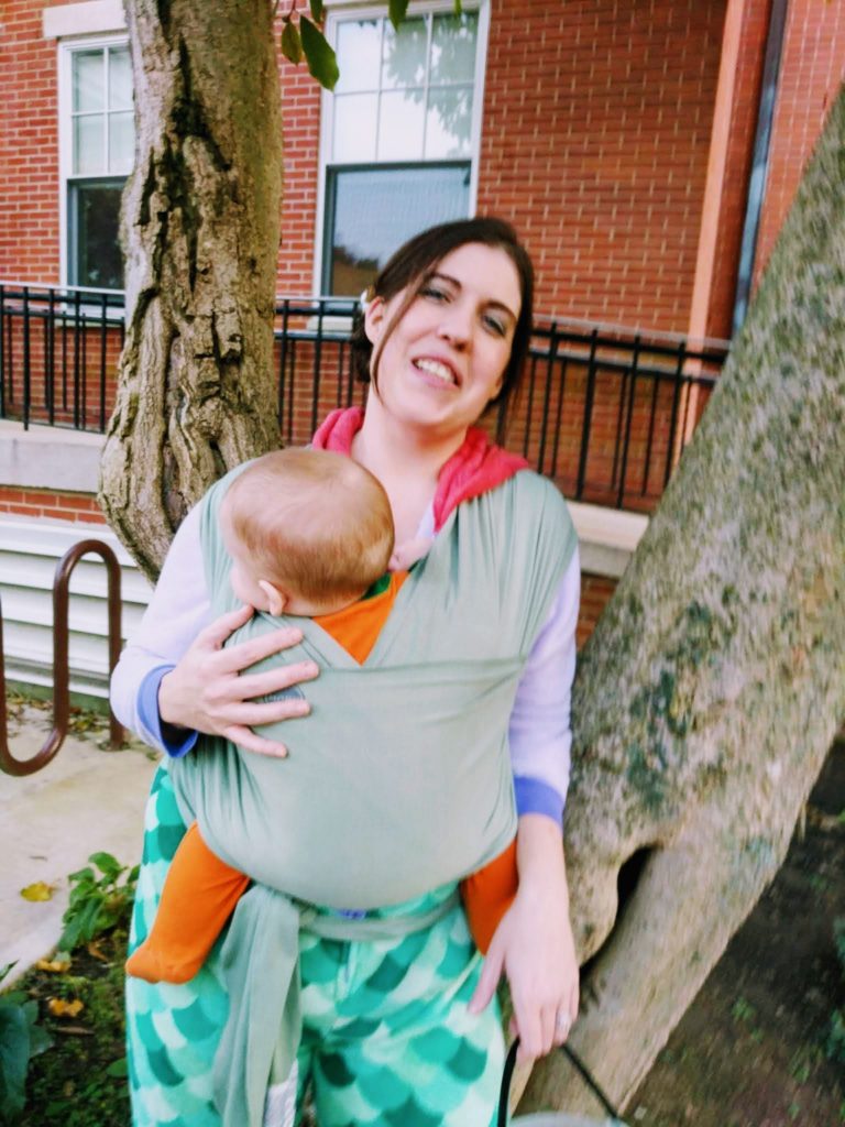 woman with baby by tree