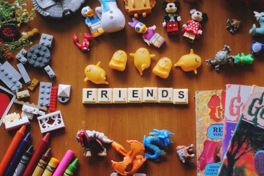 40+ Games for 3-Year-Olds: The Complete Guide 4 tiles spelling out friends surrounded by other games and toys for 3-year-olds
